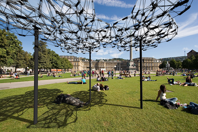 Canopy system providing shade to people underneath