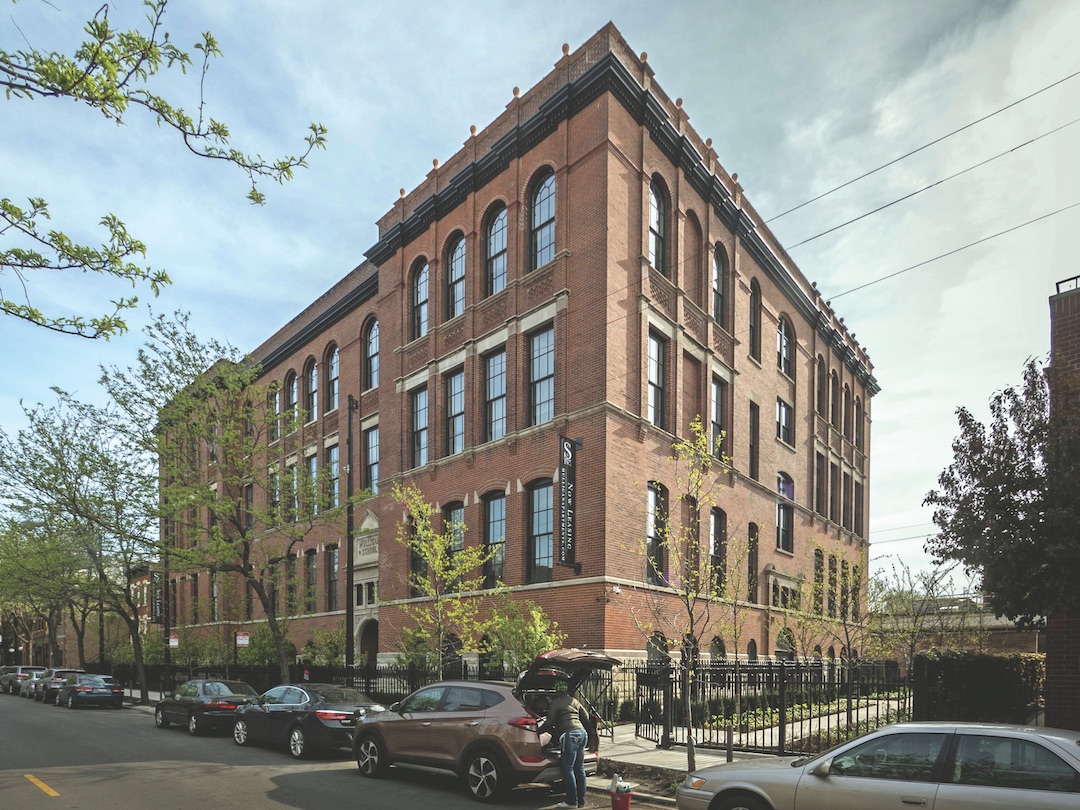 Mulligan School Apartments occupy a 25,000-sf lot between Sheffield Avenue and the CTA elevated line 