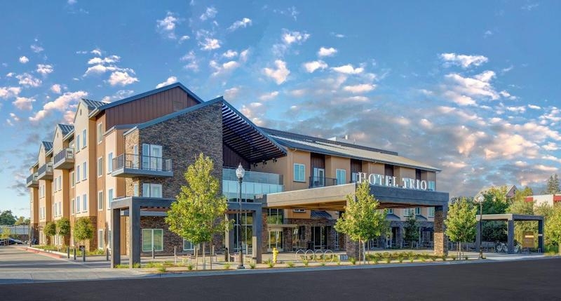 Four-story hotel and adjacent affordable housing community ...