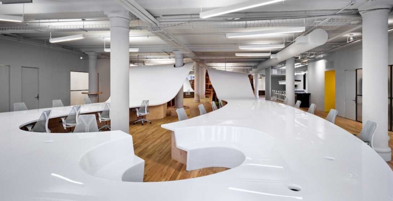 world-s-longest-desk-massive-undulating-desk-accommodates-145-office